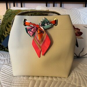 Large genuine leather bucket bag w/ small bag inside. two straps NWT